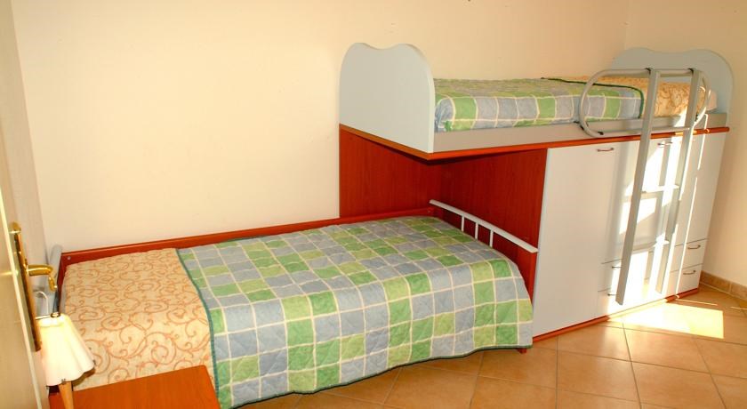 Další ložnice apartmánu BILO, San Teodoro, Sardinie