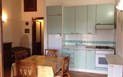 Apartmány Sole - Jídelna s kuchyňským koutem, San Teodoro, Sardinie