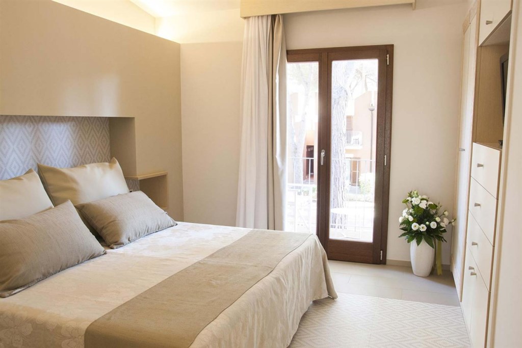 Pokoj JUNIOR SUITE, Porto Conte, Sardinie