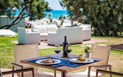 Pullman Almar Timi Ama Resort & Spa - Restaurace I Ginepri u pláže, Villasimius, Sardinie
