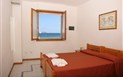 Residence Buganvillea - Výhled z ložnice apartmánu s výhledem na moře, Alghero, Sardinie