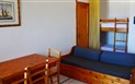 Residence Buganvillea - Obývací pokoj s palandou, Alghero, Sardinie