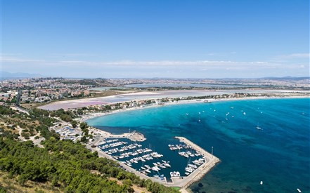 Kraj CAGLIARI - Letecký pohled na pláž Poetto v Cagliari