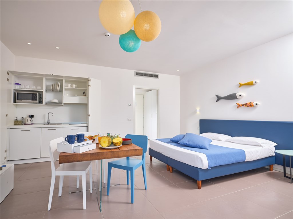 Ložnice v apartmánu, Porto San Paolo, Sardinie