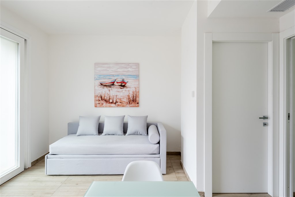 Obývací pokoj s rozkládací pohovkou, Stintino, Sardinie