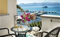 Hotel Gabbiano Azzurro - Balkón u pokoje COMFORT s výhledem na moře, Golfo Aranci, Sardinie