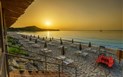 Sant' Efis Hotel - Východ slunce na pláži, Pula, Sardinie