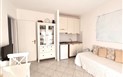 Apartmány & Resort Baia de Bahas - Obývací pokoj s kuch. koutem, Golfo di Marinella, Sardinie