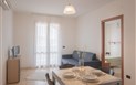 Residence Le Fontane - Bilo 4, Obývací pokoj s kuch. koutem a rozkládací pohovkou, Villasmius, Sardinie