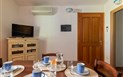 Bouganvillage Residence - Obývací pokoj s kuch. koutem Trilo, Budoni, Sardinie