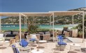 Club Hotel Baja Sardinia - Venkovní posezení, Baja Sardinia, Sardinie