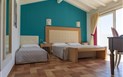 Villas Resort - Pokoj DELUXE třílůžkový, Santa Giusta, Sardinie