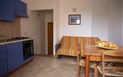 Residence Torre - Obývací pokoj s kuch. koutem, Isola Rossa, Sardinie
