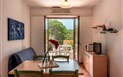 Residence Le Pavoncelle - Obývací pokoj Bilo 4, Santa Teresa Gallura, Sardinie