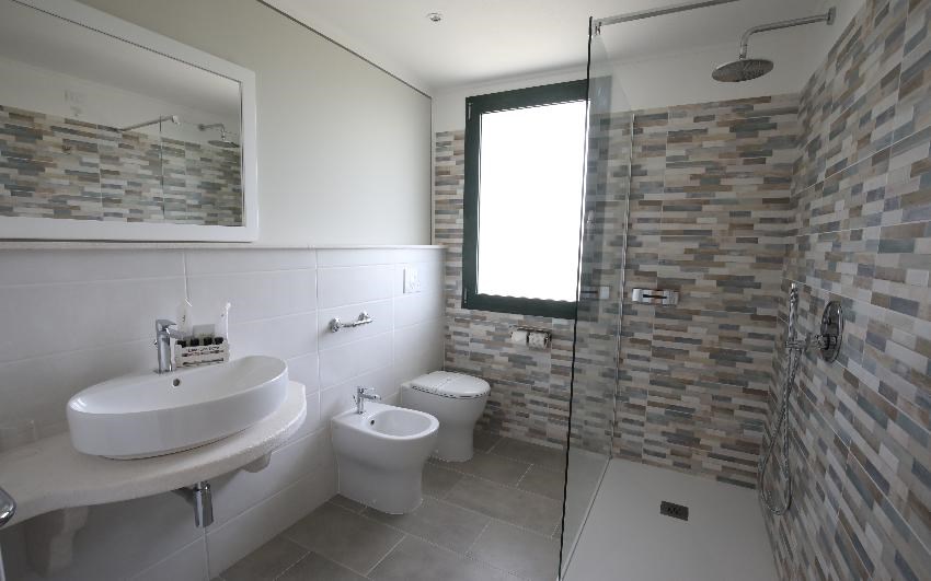 Hotel Cala dei Pini - Junior Suite koupelna, Porto Pino, Sardinie