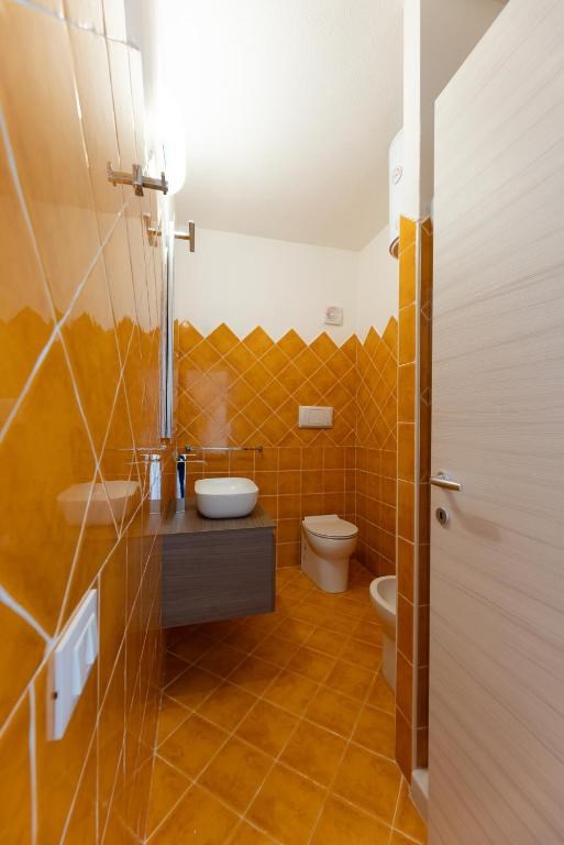 Residence Le Rocce Rosse - Koupelna, Isola Rossa, Sardinie