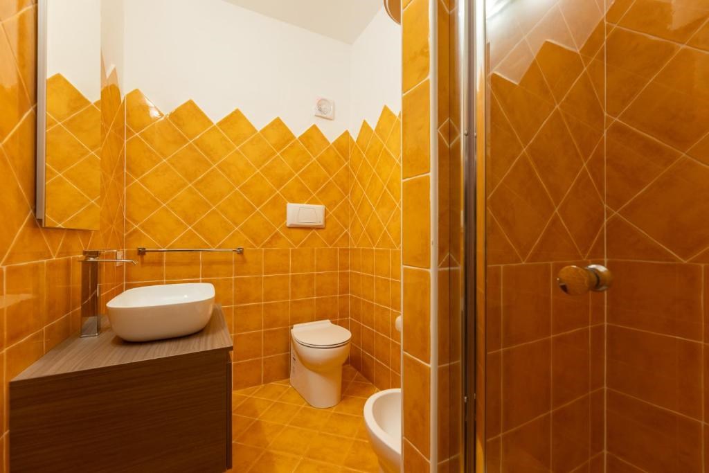 Residence Le Rocce Rosse - Koupelna, Isola Rossa, Sardinie