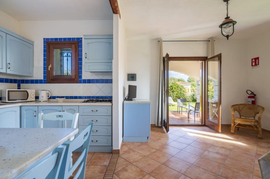 Residence Vecchio Stazzo - Kuchyně jednoho z apartmánů, San Teodoro, Sardinie