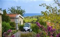 Hotel Club Rocca Dorada - Pohled na moře z hotelového parku, Santa Margherita di Pula, Sardinie