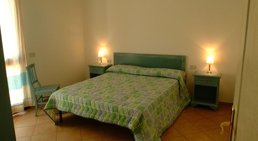 Ložnice apartmánu BILO, San Teodoro, Sardinie