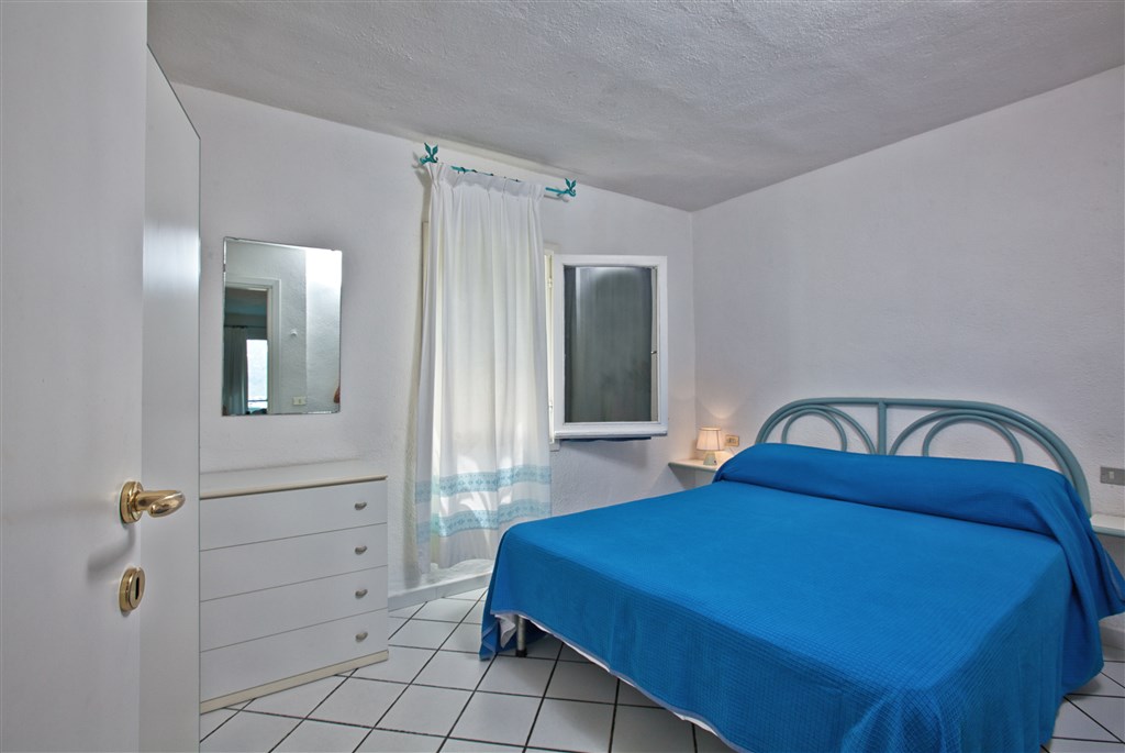Ložnice v apartmánu BILO, Porto Rotondo, Sardinie, Itálie