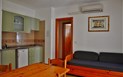 Residence Gli Eucalipti - Obývací pokoj s kuchyňským koutem, Alghero, Sardinie